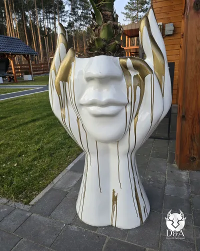 Hedendaagse bloempot met prullenbakgezicht