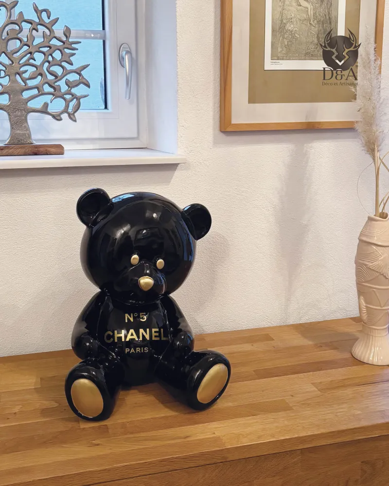 Decorative resin statue of a seated Teddy Bear personalized in