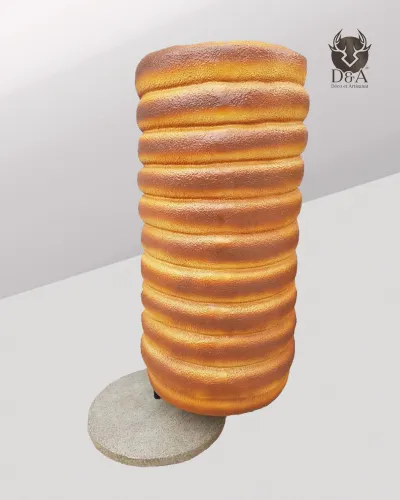 Realistic resin statue of a stack of doughnuts