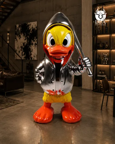 Canard avec batte de baseball chromé